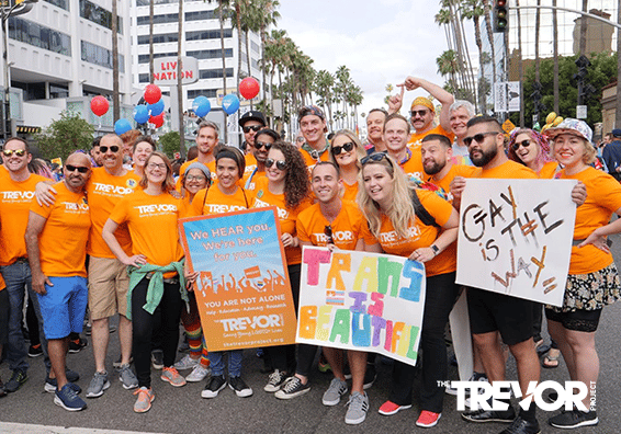 A Group With The Trevor Project Signs and Shirts