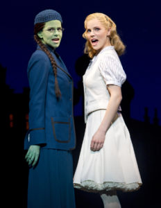 Elphaba and Glinda Facing Each Other and Singing Out