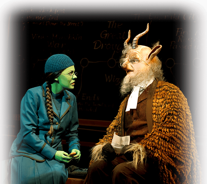 A Serious Elphaba Talking to Doctor Dillamond