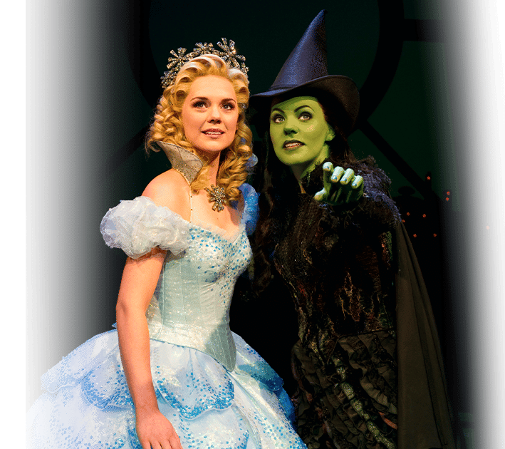 Glinda and Elphaba Standing Looking Out Into the Distance